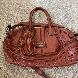 Guess burnt orange bag.